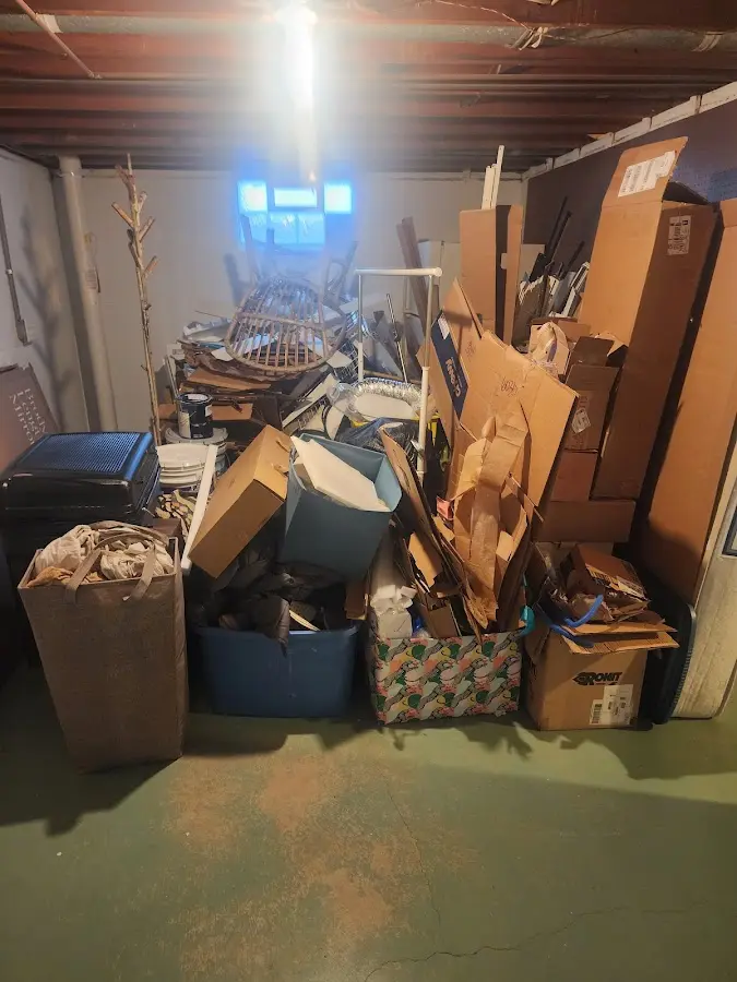 Roll-off dumpster container at job site for 20 Yard Dumpster Rental in Lehigh Acres